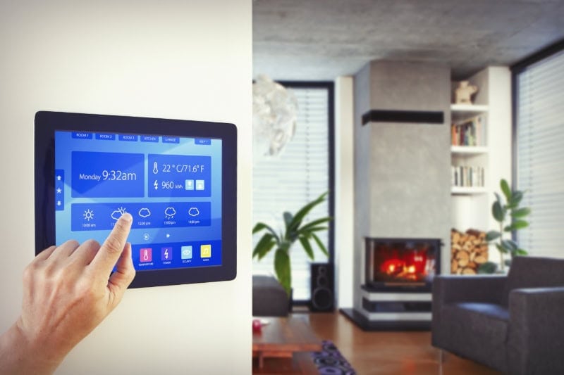 Zone Your Way to Comfort. Person using home automation to control lighting.